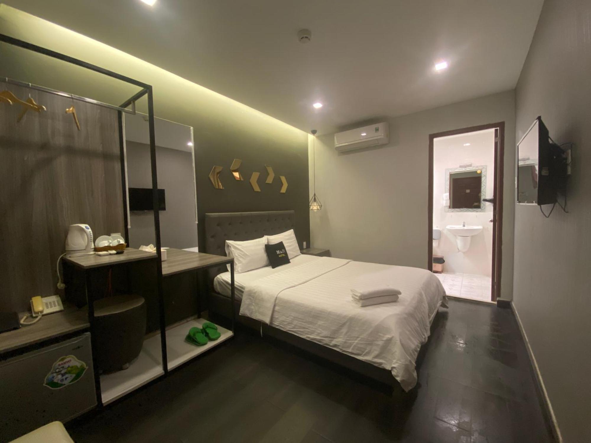 M&H Hotel Ho Chi Minh-stad Buitenkant foto