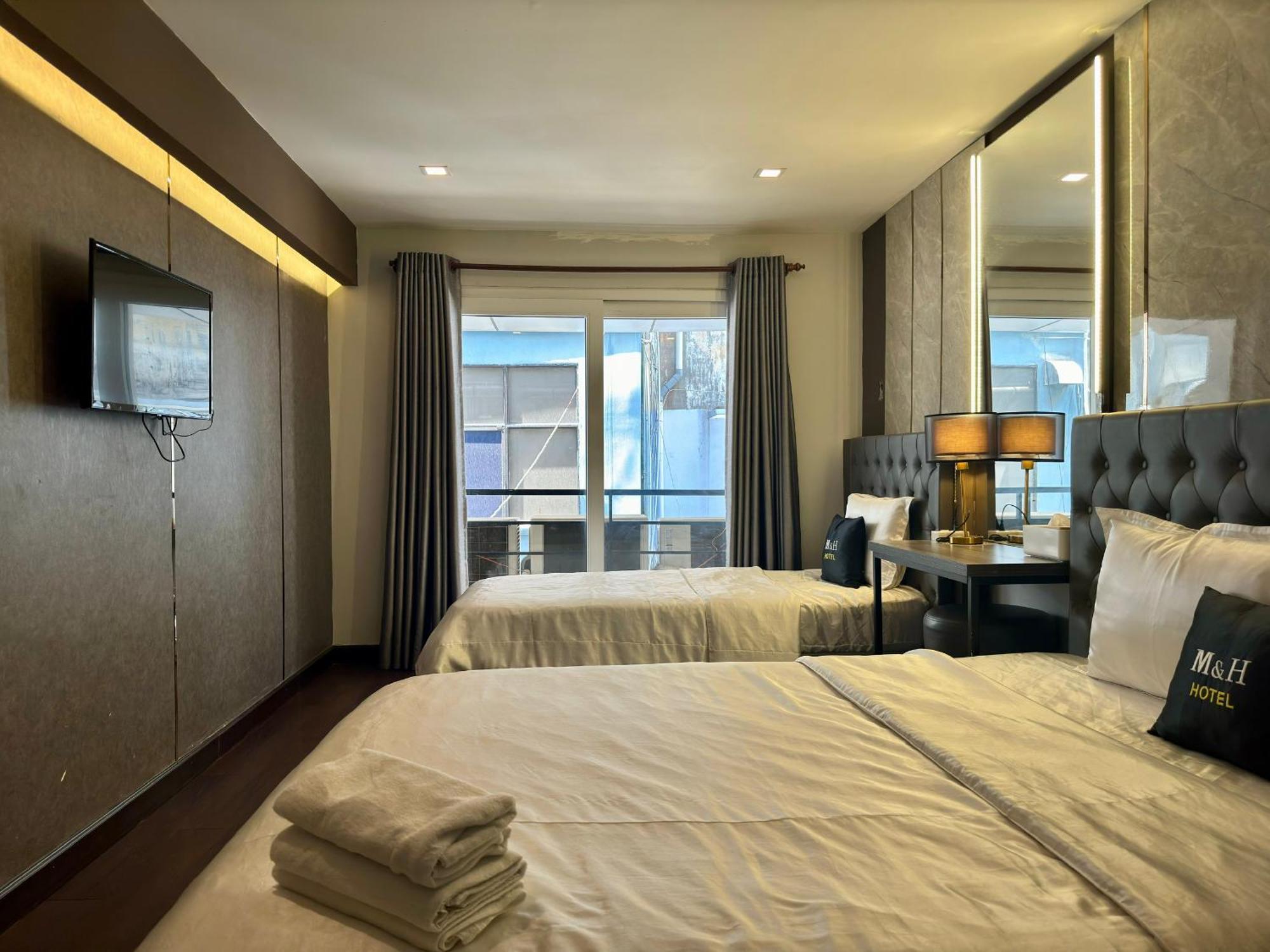 M&H Hotel Ho Chi Minh-stad Buitenkant foto