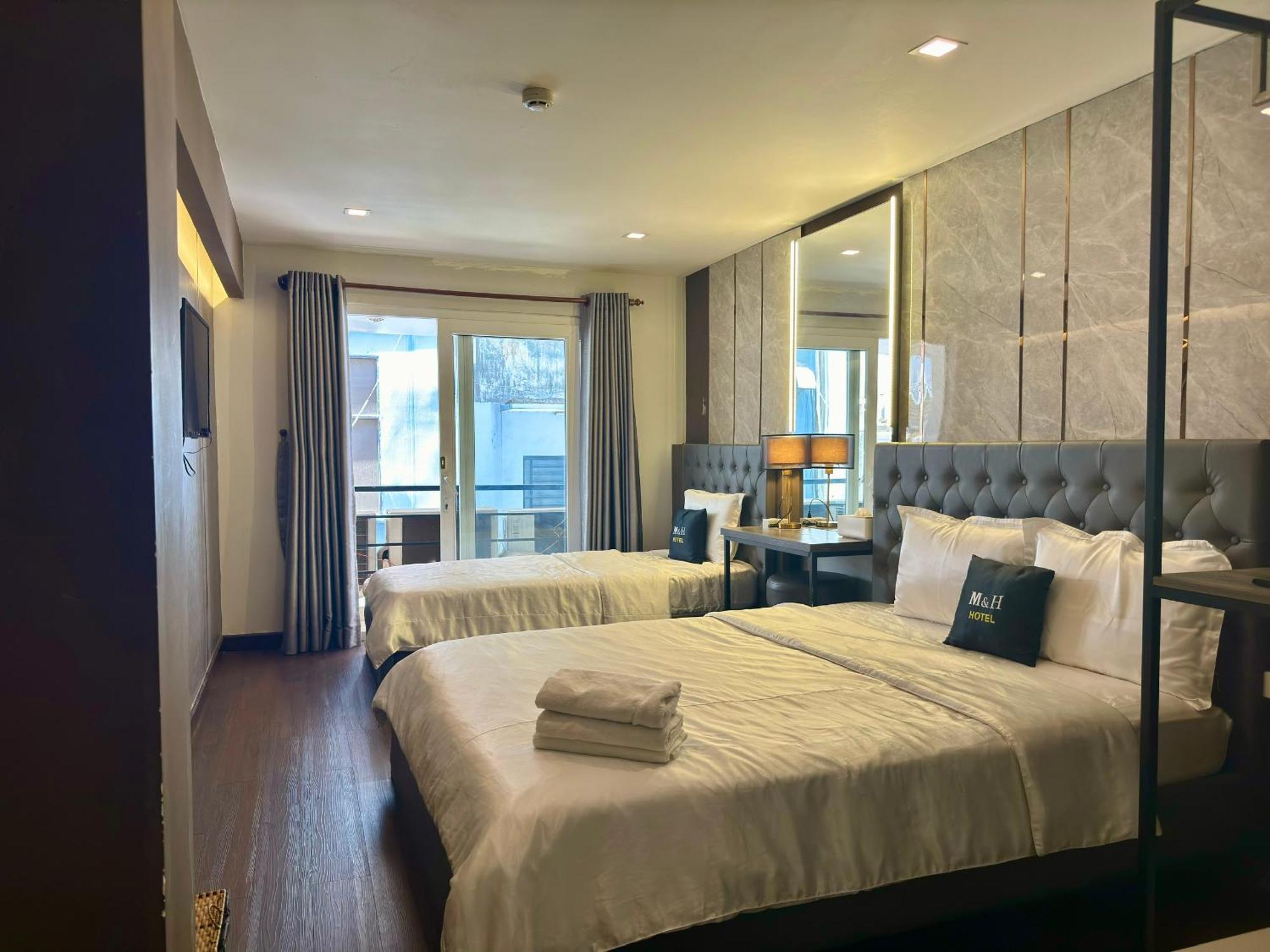 M&H Hotel Ho Chi Minh-stad Buitenkant foto