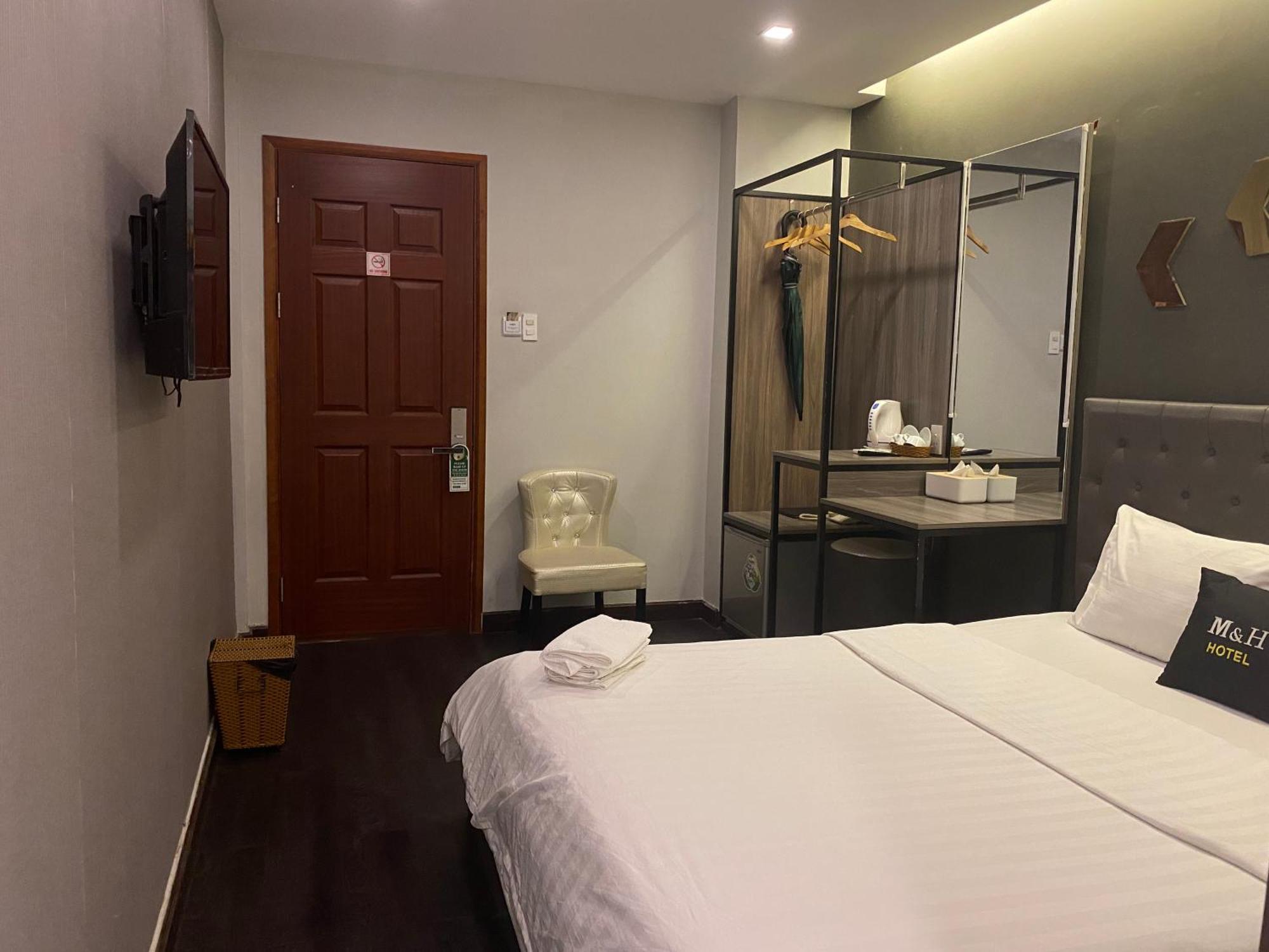 M&H Hotel Ho Chi Minh-stad Buitenkant foto