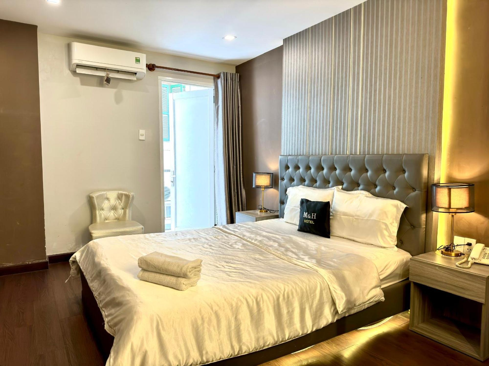 M&H Hotel Ho Chi Minh-stad Buitenkant foto