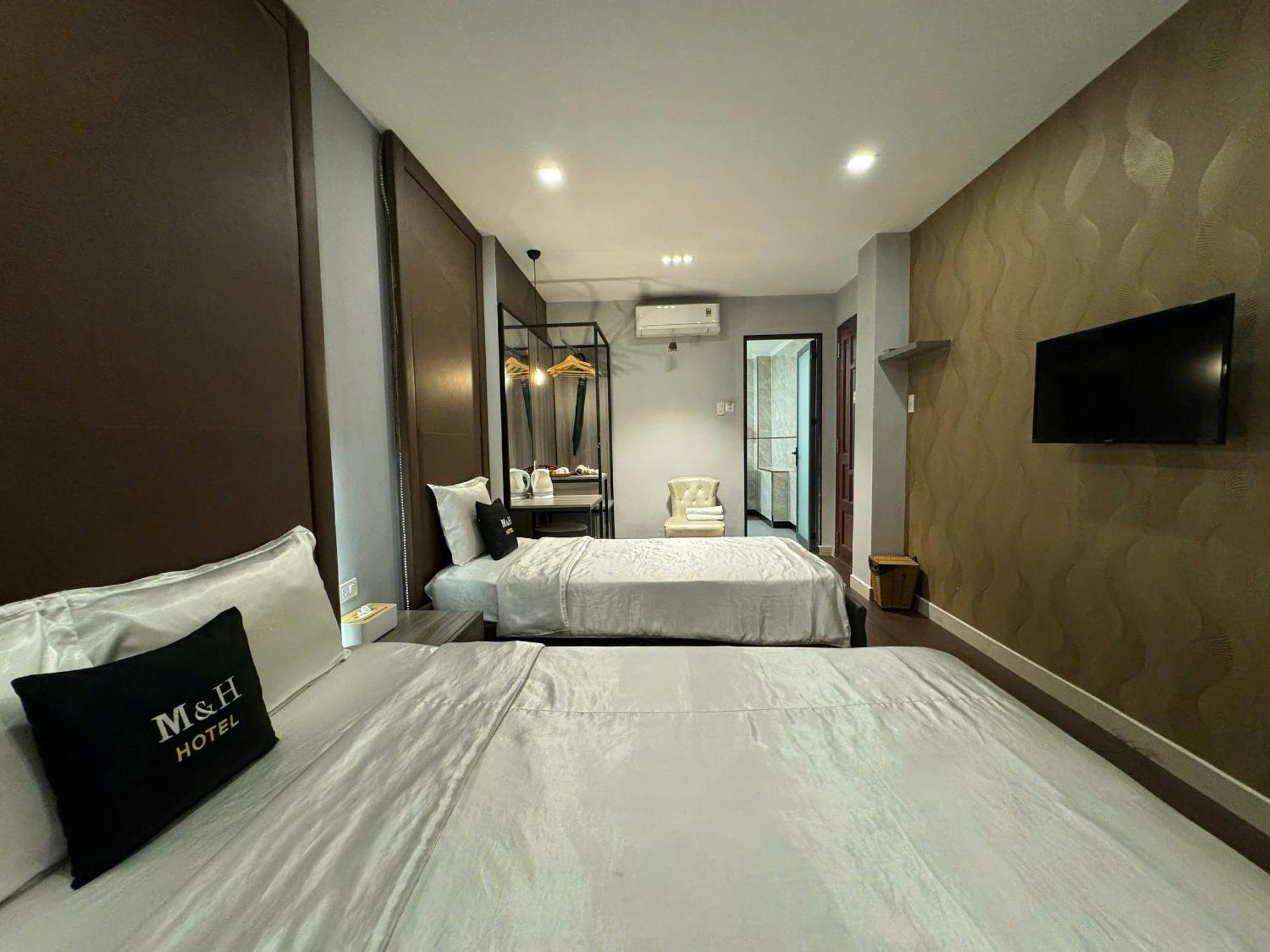 M&H Hotel Ho Chi Minh-stad Buitenkant foto